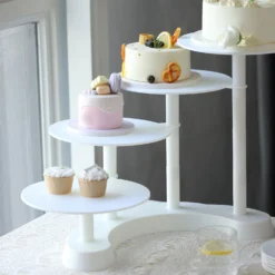 4-Tier Half Moon White Plastic Pedestal Riser, Display Stand With Multiple Pedestals - 17" Tall 21 4-Tier Half Moon White Plastic Pedestal Riser, Display Stand With Multiple Pedestals - 17" Tall -Home Decor Promotional Store CAKE PLST R005 4 WHT D01.progressive 6de70d38 e9d8 4a9d b3a0 02f00d287748