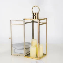 Gold Vintage Top Stainless Steel Candle Lantern Centerpiece Outdoor Metal Patio Lantern -Home Decor Promotional Store CAND LANT003 L GOLD D10.progressive 54108f94 5e83 47b2 a57d d50a0ae8ccd1