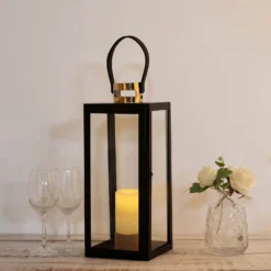 Black & Gold Top Stainless Steel Candle Lantern Centerpiece Outdoor Metal Patio Lantern 31 Black & Gold Top Stainless Steel Candle Lantern Centerpiece Outdoor Metal Patio Lantern -Home Decor Promotional Store CAND LANT003 M BLK D01.progressive dccbce61 7ba6 4a65 acd1 ba5ea53c6158