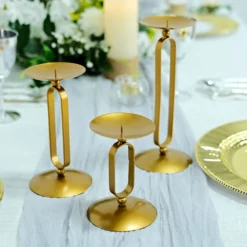 Set Of 3 | Gold Metal Oval Frame Pillar Candle Holder Stands, Geometric Table Centerpieces - Assorted Sizes -Home Decor Promotional Store IRON CAND PL001 SET GOLD D07.progressive 03bc9751 d16a 4a36 9baf b616069a9c47