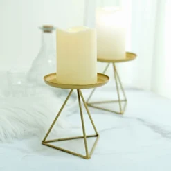 2 Pack Gold Metal Triangle Base Pillar Candle Holder Stands, Geometric Candle Centerpieces 5" -Home Decor Promotional Store IRON CAND PL002 M GOLD D05.progressive fb57ec0e 75ab 4b21 ae68 f744d3025569