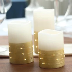 Set Of 3 | Flameless LED Remote Operated Pillar Candles Wrapped With Fairy String Lights, Battery Powered - 4", 5", 6" 21 Set Of 3 | Flameless LED Remote Operated Pillar Candles Wrapped With Fairy String Lights, Battery Powered - 4", 5", 6" -Home Decor Promotional Store LED CAND PL04 GOLD 02