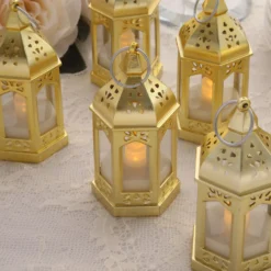 6 Pack Gold Vintage Mini Lantern With Flickering LED Tealight Candles, Moroccan Style Battery Operated Warm White Candle Lantern Lamp Centerpieces - 3.5" -Home Decor Promotional Store Pack Gold Vintage Mini Lantern with Flickering LED Tealight Candles 8