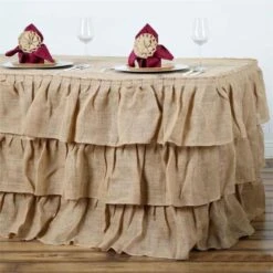 Natural 3 Tier Rustic Ruffled Burlap Table Skirt -Home Decor Promotional Store SKT JUTE RUF 17 01 a10a2e65 0ce3 4d4f ab9c b43a3a79db9d