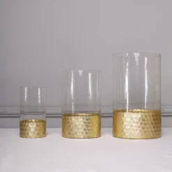 Set Of 3 - Glass Cylinder Vases With Gold Honeycomb Base - Glass Candle Holders - 6", 8", 10" 23 Set Of 3 - Glass Cylinder Vases With Gold Honeycomb Base - Glass Candle Holders - 6", 8", 10" -Home Decor Promotional Store VASE A26 SET01 GOLD D08.progressive dff3c4e2 13ab 4a20 9196 3ffb19ec3752